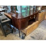 A 19th century inlaid mahogany sideboard, the single drawer flanked by a pair of panelled cupboard