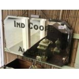 IND COOPE ALLSOPP; an Art Deco advertising mirror, 41 x 69cm.