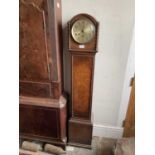 WARING & GILLOW; an early 20th century oak cased granddaughter clock, height 133cm.