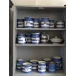 T G GREEN; eighteen pieces of Cornish ware, including jars for rice, sugar, caster sugar,