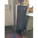 STOR; a vintage metal twenty-one drawer filing cabinet.