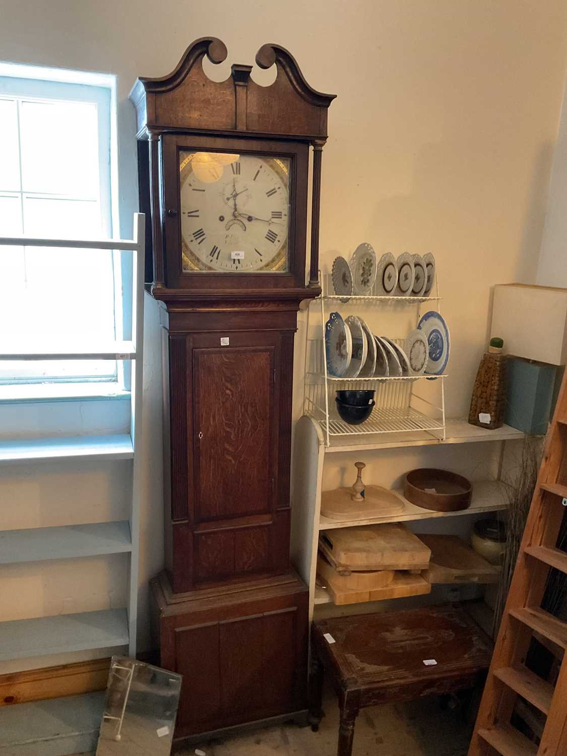 CHESTER; an 18th century eight day longcase clock, the painted dial set with Roman numerals and