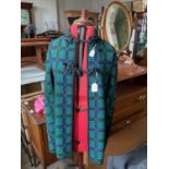 A vintage expandable tailors' dummy, with a mannequin, and two vintage coats (4)