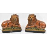 A pair of 19th century Staffordshire stoneware figures of lions, height 25cm.