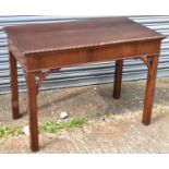 A 19th century mahogany hall table in the Chippendale style with rectangular top on square supports,