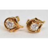 A pair of 14ct yellow gold diamond set earrings, each approx 0.5ct.