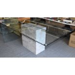 ARTEDI; a large contemporary dining table with rectangular bevelled plate glass top on substantial