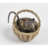 An Elizabeth II hallmarked silver novelty ornament modelled as a mouse in a wicker basket, London