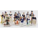 A group of fourteen Staffordshire figures including Waiter, L Byron, etc.