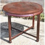 A modern circular occasional table raised on four rectangular supports to bun feet, diameter 80cm.