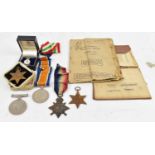 A group of five World War II medals, a soldier's release book, and an HM Armed Forces Veteran