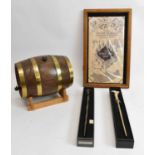 HARRY POTTER; two boxed wands, each approx 36cm, a marauder's map in presentation case, also a brass