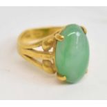 A Chinese jade set gold ring, size J, approx 9.4g.