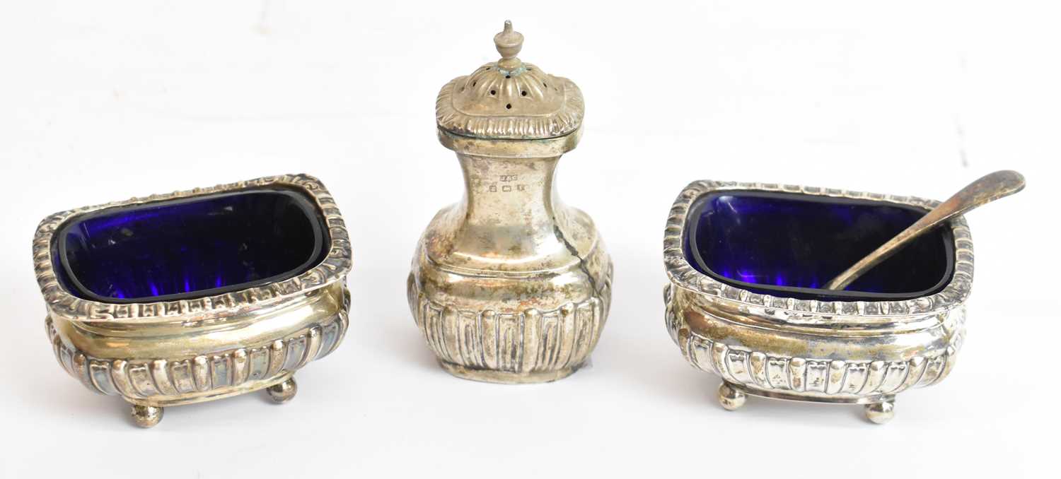 JONES & CROMPTON; an Edwardian VII hallmarked silver three piece cruet set, Birmingham 1908, 3.