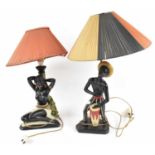 A pair of 1950s painted plaster novelty exotic table lamps with shades, tallest height approx 35cm.