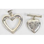 A hallmarked silver love heart shaped pendant with detachable top, and a hallmarked silver brooch,