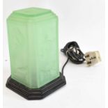 An Art Deco table lamp with decorative green glass shade and stepped base, height approx 20cm.