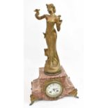 An early 19th century French eight day mantle clock surmounted with spelter figure (Chamuse) on a