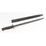 A World War I 1907 pattern sword bayonet with scabbard, overall length 57cm.