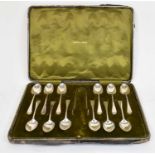 FRANCIS STEBBINGS; a set of twelve George V hallmarked silver teaspoons with tongs, London 1914,