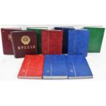 A quantity of Russian and Lithuanian stamps in nine stock books and one lose album.