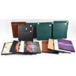 Seven albums of First Day Covers up to 2010 and twelve year books.