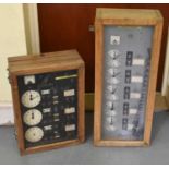 Two oak cased 20th century factory clocks, height of tallest 66cm.