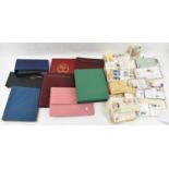 A quantity of GB First Day Covers and sheets of GB stamps with small quantities of foreign covers