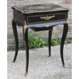 A French ebonised and brass inlaid vanity table with hinged lid enclosing interior mirror and lift-