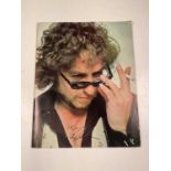 BOB DYLAN; a promotional large format pictoral booklet bearing the star's signature to the front