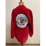 ALAN RUDKIN MBE; a red velvet boxing robe with large stitched badge inscribed 'Alan Rudkin