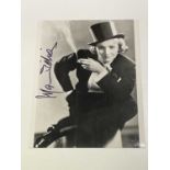 MARLENE DIETRICH; a black and white photograph of the Hollywood icon bearing her signature with note