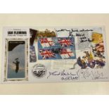 JAMES BOND; an Ian Fleming first day cover bearing the signatures of Roger Moore, David Henderson