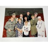 'ALLO 'ALLO; a promotional photograph of the cast multi-signed including Gordon Kaye, 20 x 25cm,