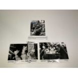 Three black and white promotional photographs each bearing signatures including Michael J Fox, Rob