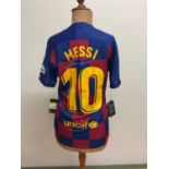 LIONEL MESSI; a Barcelona replica home shirt (small) bearing the signature to the reverse.