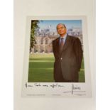 JACQUES CHIRAC; a photograph of the former French President bearing his signature in French, 24 x