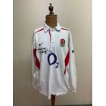JONNY WILKINSON; a replica England rugby long sleeve shirt, signed and inscribed 'All the very