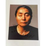 YOKO ONO; a large colour photograph bearing her signature with doodle and inscription