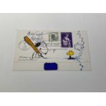 CHARLES SCHULZ; a first day cover bearing his signature and inscribed 'Best Wishes' the the front,