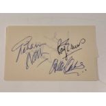 THE HOLLIES; a page from an autograph book bearing the signature of Allan Clarke, Graham Nash and