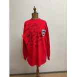 ENGLAND WORLD CUP WINNERS 1966; a replica long sleeve jersey, multiple signed including Hunt,