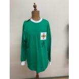 GEORGE BEST; a replica Northern Ireland home shirt, bearing the star's signature and inscribed 'Best