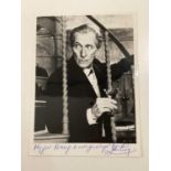 PETER CUSHING; a black and white photograph inscribed 'May God's blessing be with you always,