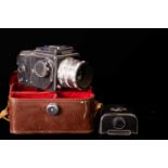 ZENITH; an 80 camera with accessories and 7002783 Industar lens, fitted in leather travel case.
