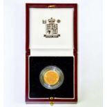 An Elizabeth II half gold proof sovereign, 2000, encapsulated, with outer box. Condition Report: