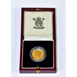 An Elizabeth II cased gold proof full sovereign, 2000, encapsulated and fitted in box.