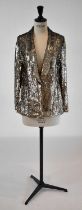 GRYPHON; a gold sequined fitted evening jacket, size XS