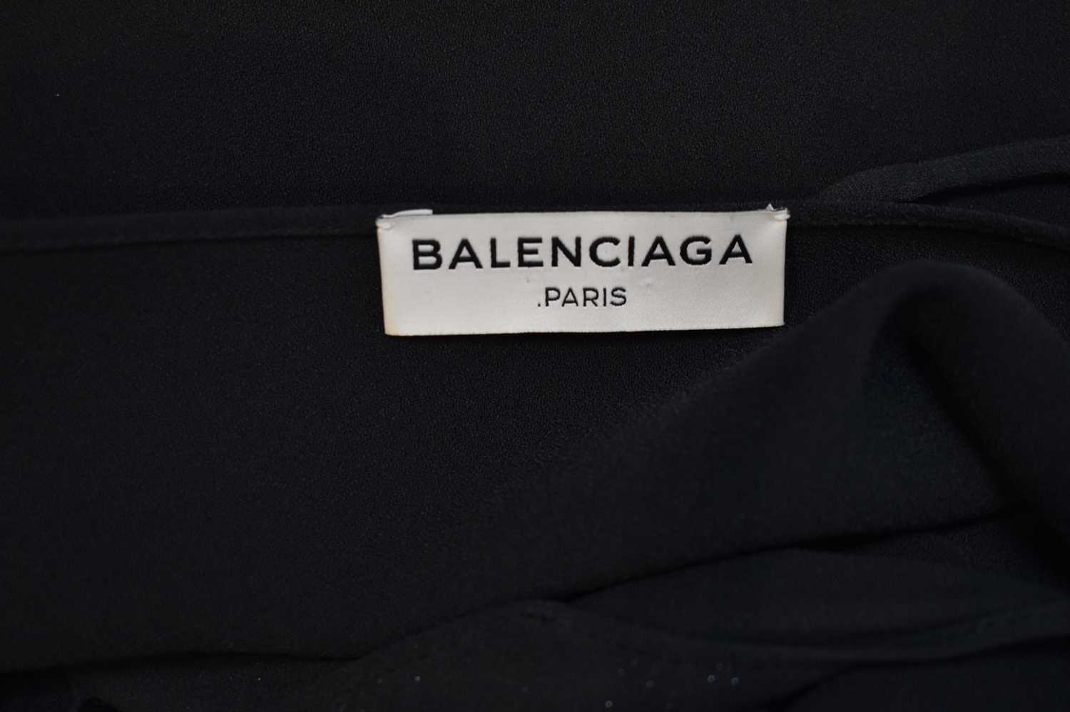 BALENCIAGA; a black wool A-symmetrical dress with spaghetti straps and matching cape, both with - Image 4 of 4