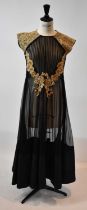 RIDHI MEHRA; a black and silk taffeta full length evening dress with gold embroidered